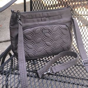 LUG SAMBA CONVERTIBLE CROSSBODY BAG. Like new. Tons of pockets. RFID protected